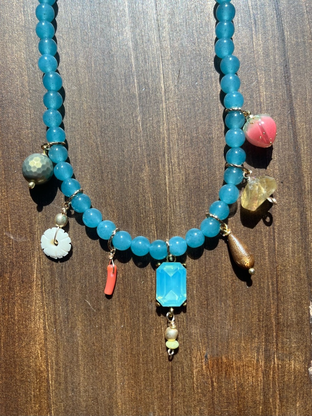 NWOTTurquoise color Multi-Charm Beaded Necklace